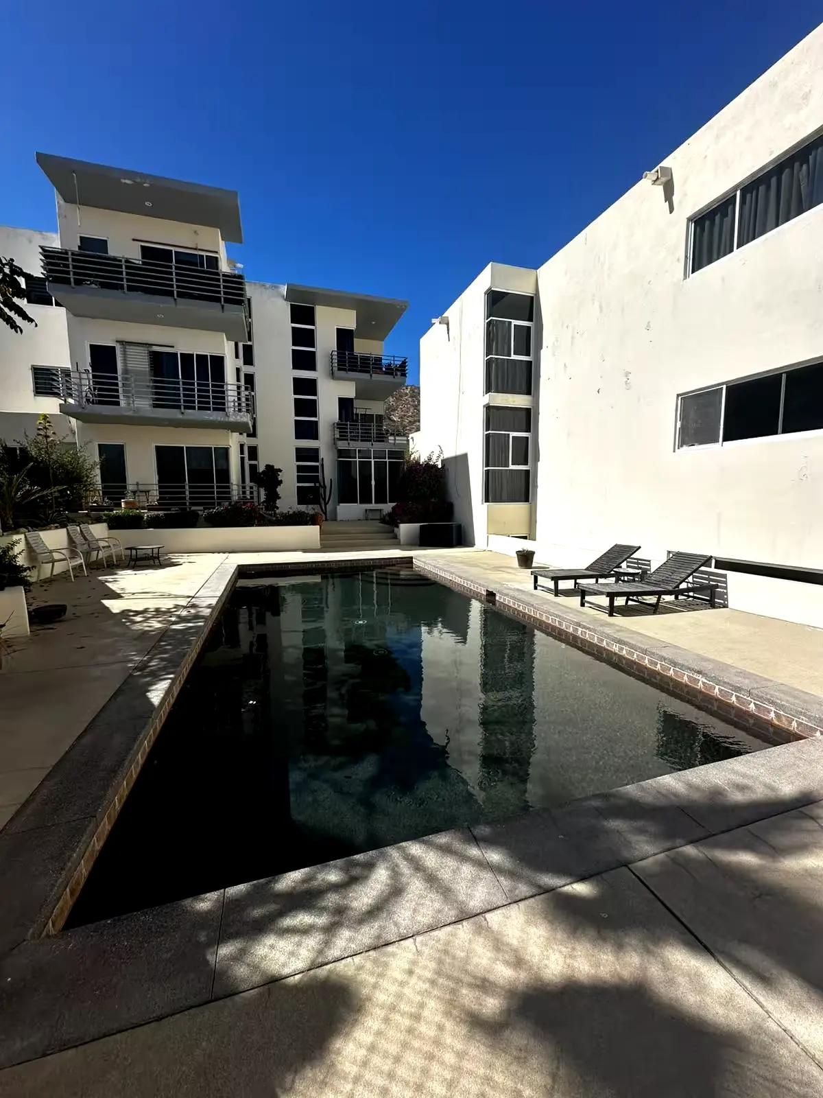 2 br accommodation with central location and access to pool overlooking the bay.